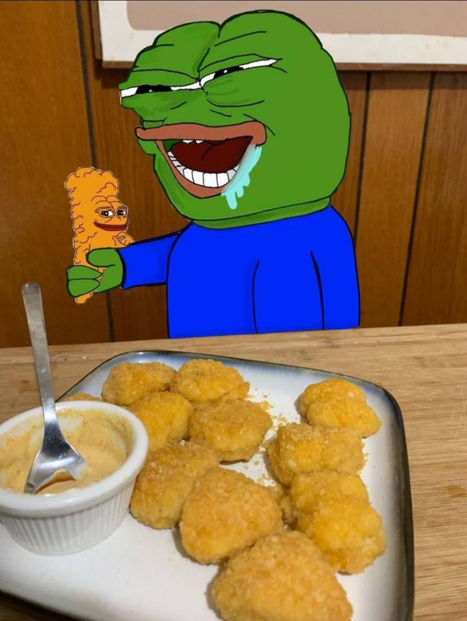 Pepe drooling over a plate of nuggets