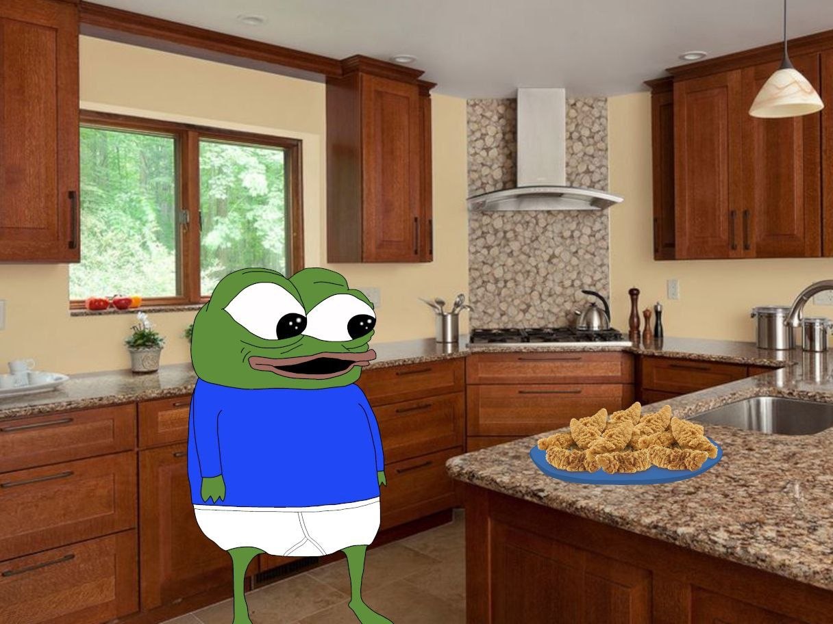 Pepe eyeing a plate of tenders on the counter